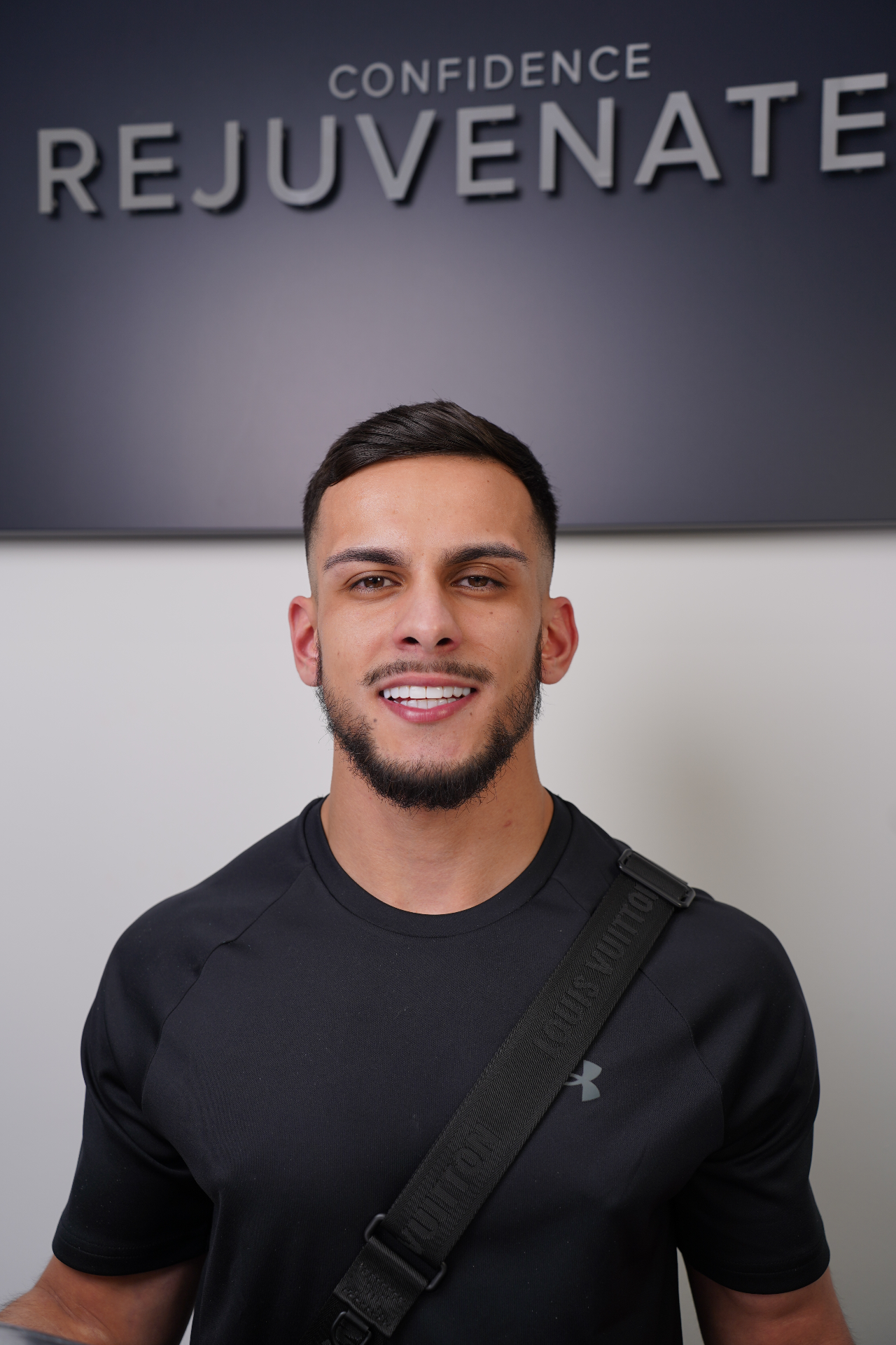 Composite bonding patient portrait after treatment at Re-Ignite Dental